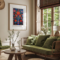 a living room filled with furniture and a painting on the wall