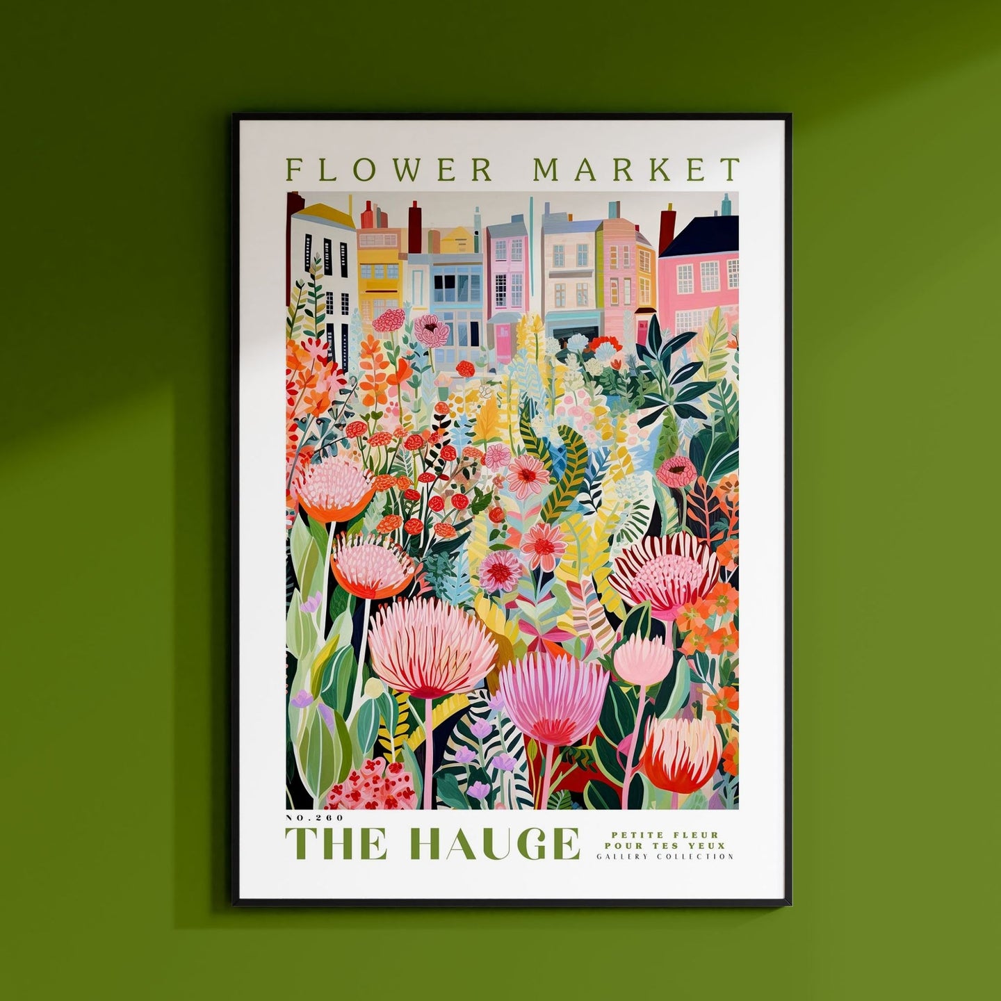 a green wall with a picture of flowers on it