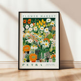 a picture of a flower market poster hanging on a wall