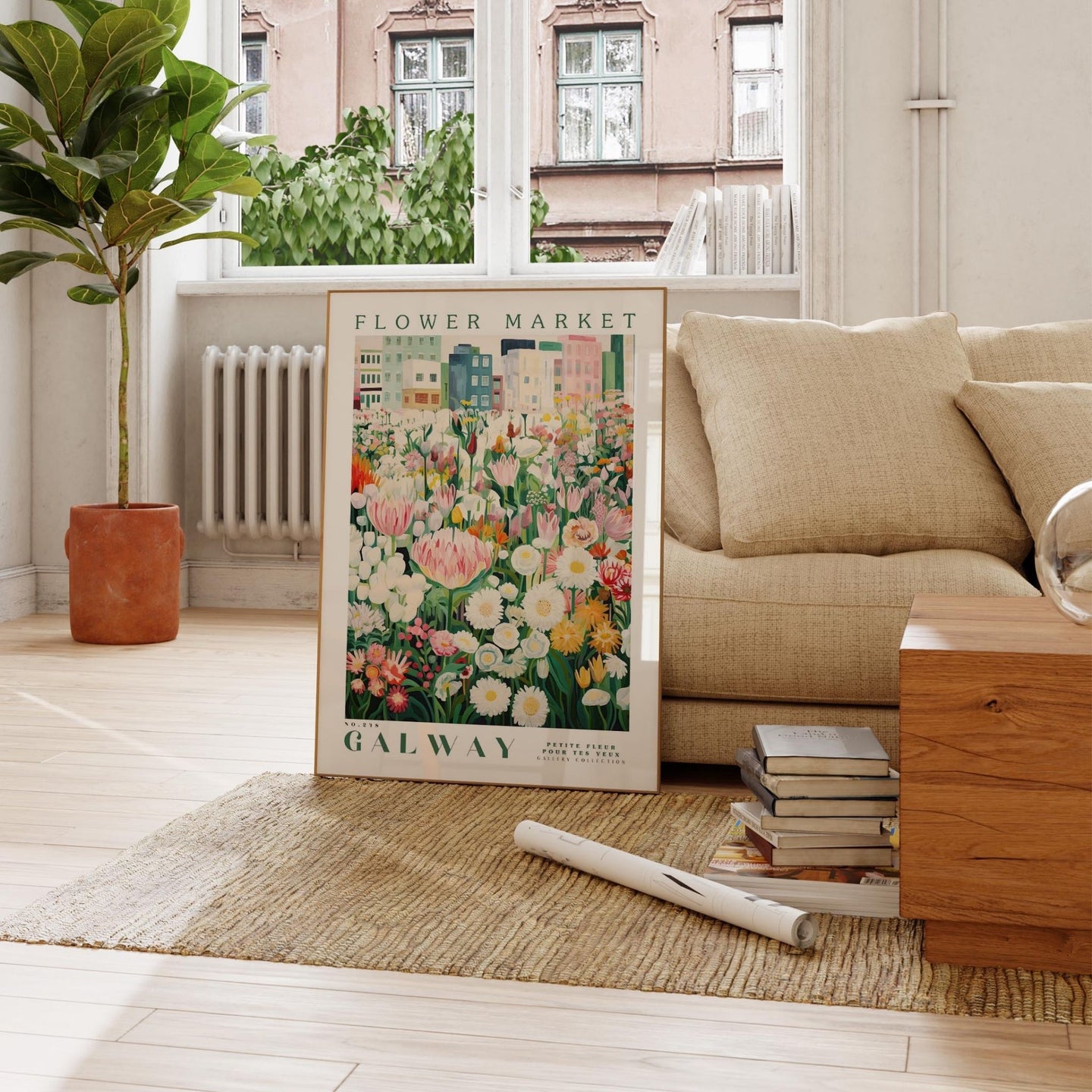 a living room with a couch and a poster on the floor