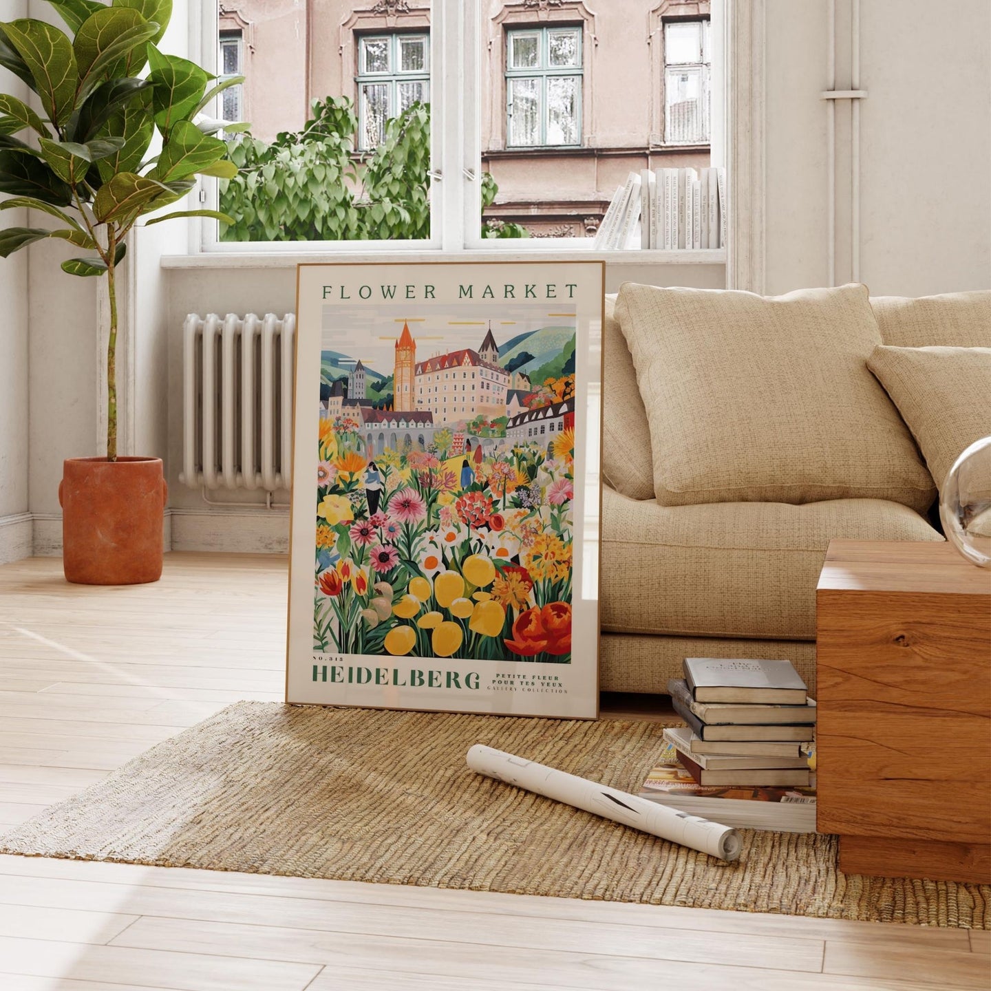 a living room with a couch and a poster on the floor