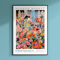 a flower market poster hanging on a wall