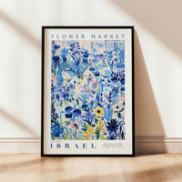 a flower market poster hanging on a wall