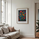 a living room with a couch and a painting on the wall