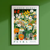 a green wall with a picture of a flower market
