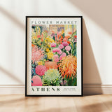 a flower market poster hanging on a wall