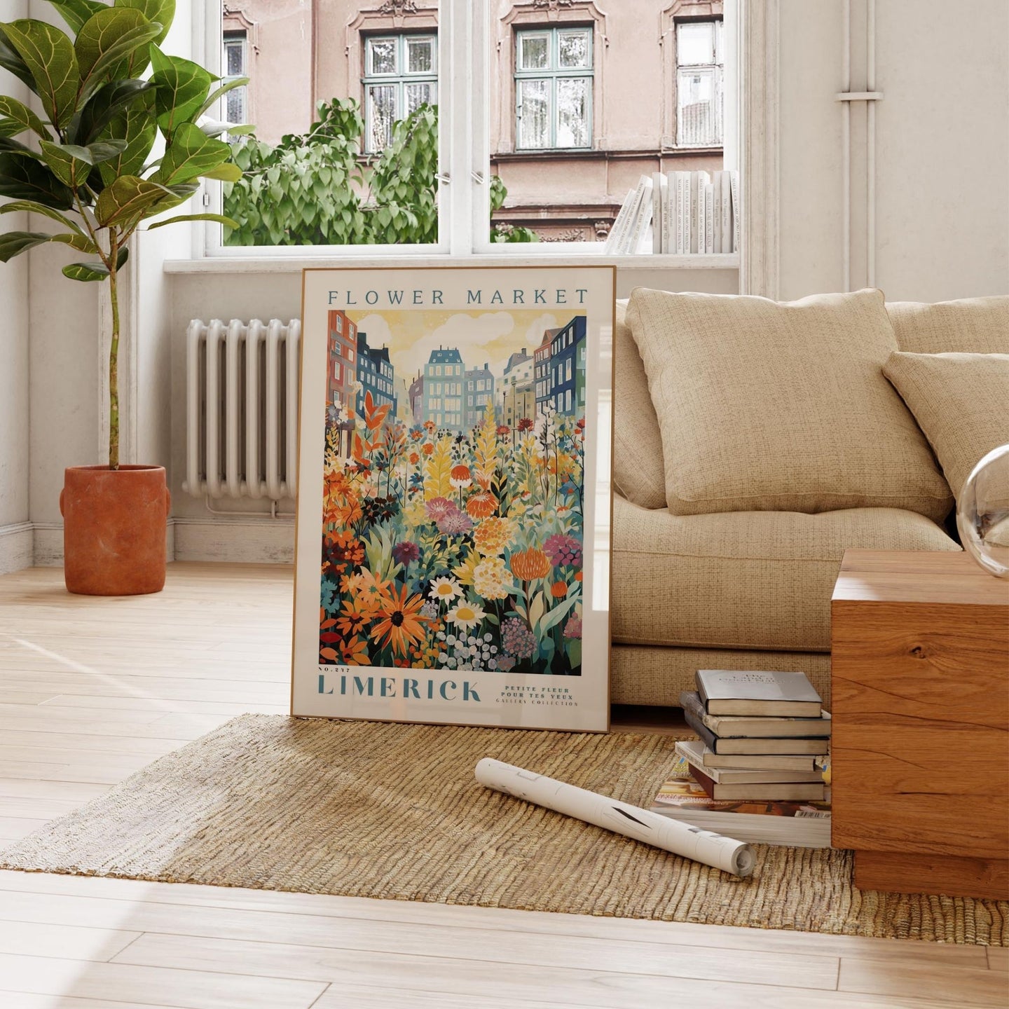 a living room with a couch and a poster on the floor