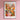 a flower market poster hangs on a pink wall