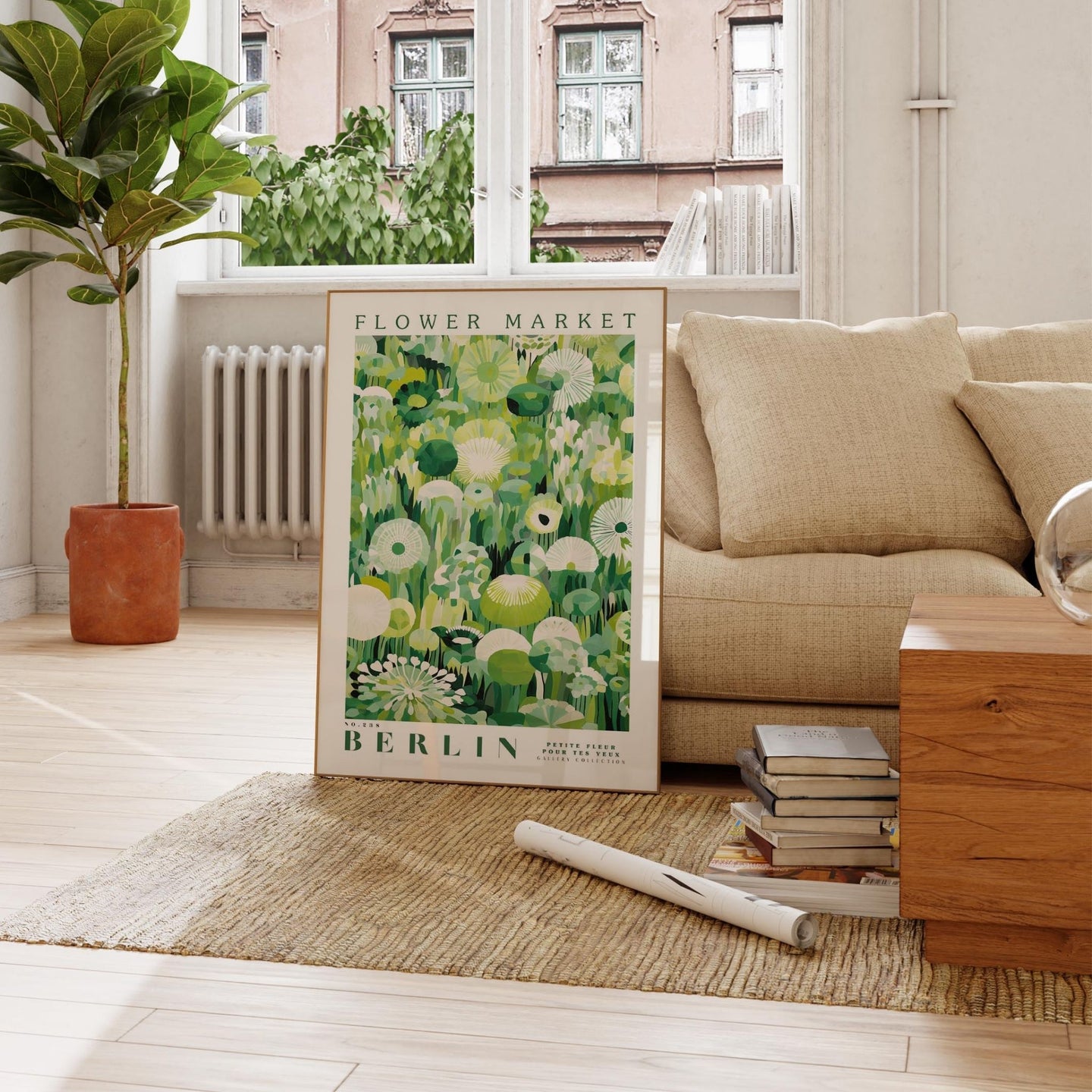 a living room with a couch and a poster on the floor