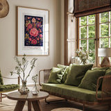 a living room filled with furniture and a painting on the wall