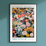 a flower market poster hanging on a wall
