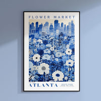 a blue and white poster hanging on a wall
