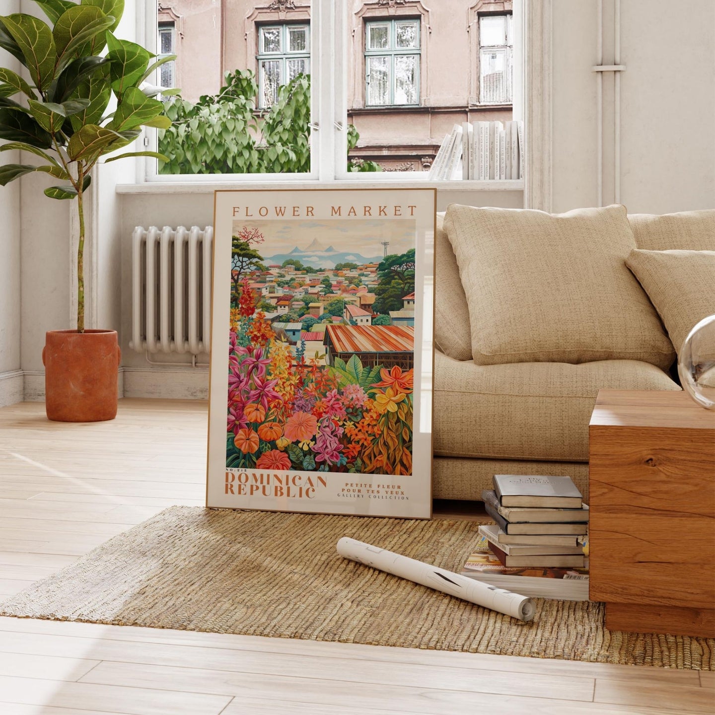 a living room with a couch and a painting on the floor