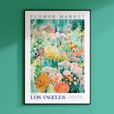 a flower market poster hangs on a green wall
