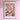 a pink flower market poster hangs on a pink wall